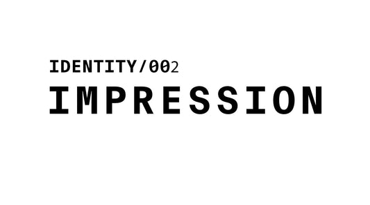 Minimalist graphic with black text on a white background reading 'IDENTITY/002' and 'IMPRESSION'