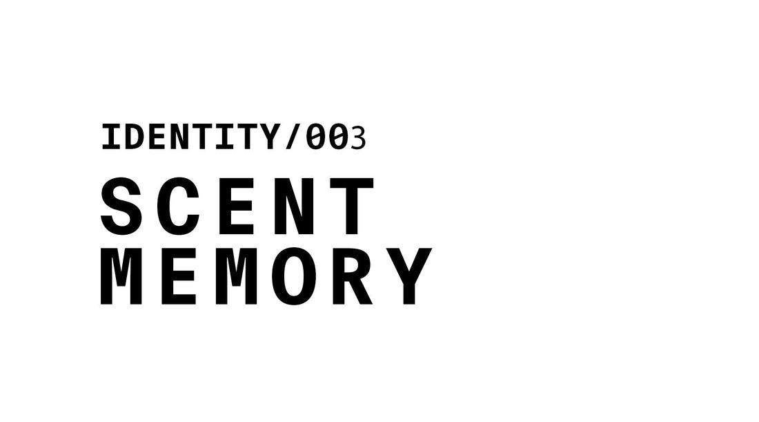 A minimalist typographic graphic displaying the text 'IDENTITY/003' stacked above the words 'SCENT MEMORY' in bold, black lettering on a white background.