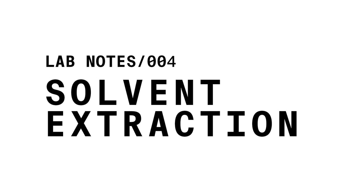 The image displays the text "LAB NOTES/004" followed by "SOLVENT EXTRACTION" in large, bold, black letters, all centered on a white background.