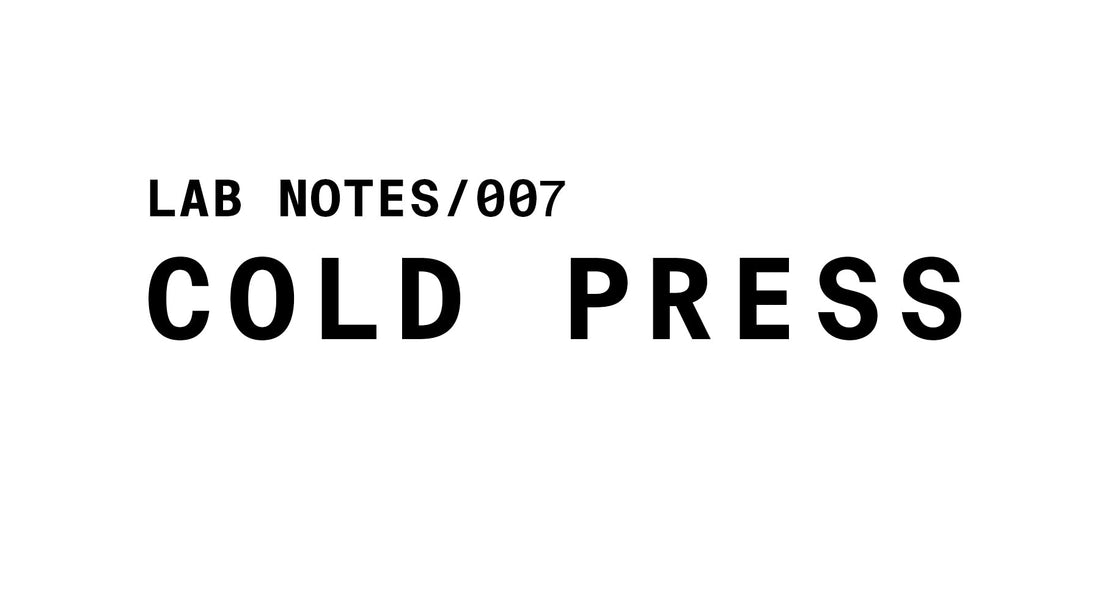 The image is a black and white graphic with the words "LAB NOTES/007" at the top left in a smaller, sans-serif font. Below it, in a much larger, bold sans-serif font, are the words "COLD PRESS". The background is plain white.