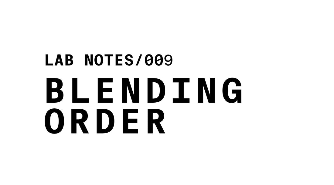 The image is a white banner with black text. At the top left, it reads "LAB NOTES/009". Below that, in a larger, bold font, it says "BLENDING ORDER".