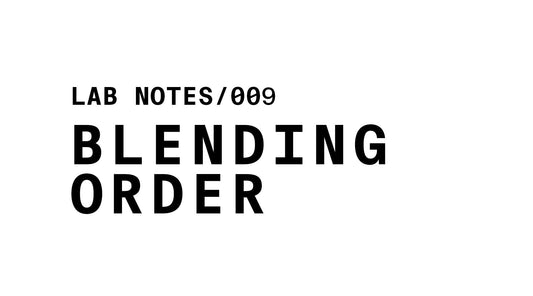 The image is a white banner with black text. At the top left, it reads "LAB NOTES/009". Below that, in a larger, bold font, it says "BLENDING ORDER".