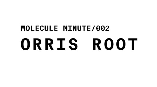 A simple title card for a series. It features bold, black text on a plain white background. The top line reads "MOLECULE MINUTE/002" in a smaller font, and the bottom line, "ORRIS ROOT," is displayed in a larger, more prominent font