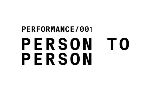 Text graphic labeled 'PERFORMANCE/001' with the bold text 'PERSON TO PERSON' written below.