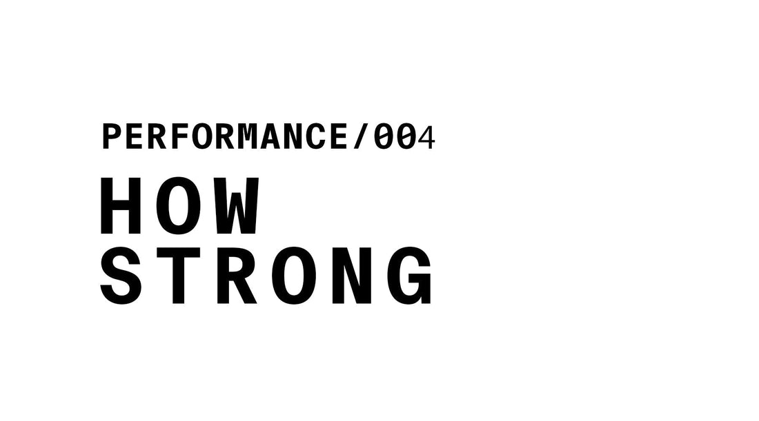 Text graphic labeled 'PERFORMANCE/004' with the bold question 'HOW STRONG' written below.